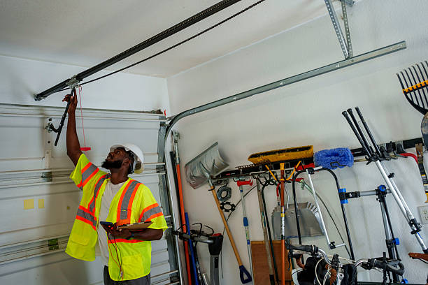 Professional Garage Door Panel Replacement technician working in Ulster County County, NY